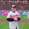 Composer John Williams threw out the first pitch for the Baltimore Orioles before a game against the Boston Red Sox.