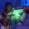A violinist playing one of Tim Linhart's ICEstruments.