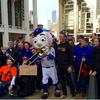 Mr. Met poses with Metropolitan Opera Musicians and Staff at Lincoln Center