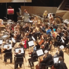 The Colorado Symphony embraced its inner nerd by letting this T-rex conduct the theme from 'Jurassic Park.'