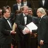 Andreas Grossbauer (L) and Clemens Hellsberg (C) of the Vienna Philharmonic receive the Birgit Nilsson Prize from Swedish King Carl XVI in Stockholm, on October 8, 2014