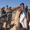 Soldiers talking to village elders in Afghanistan.