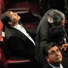 Presidents Rafael Correa of Ecuador (L) and Alan Garcia of Peru (foreground), look at the ceiling of the Congress, as a powerful 7.2 magnitude earthquake rocks central Chile, during the inauguration c