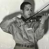 Everett Lee performs the violin in his Tuskeegee Airmen uniform in 1943.