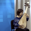 Wu Man performs in the WQXR studio. 