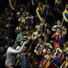 Gustavo Dudamel conducts the Simon Bolivar Symphony Orchestra before the beginning of the swearing-in ceremony of the new ministers in Caracas, on April, 22, 2013.