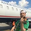 Zach De Pue performs at Charlotte Douglas International Airport